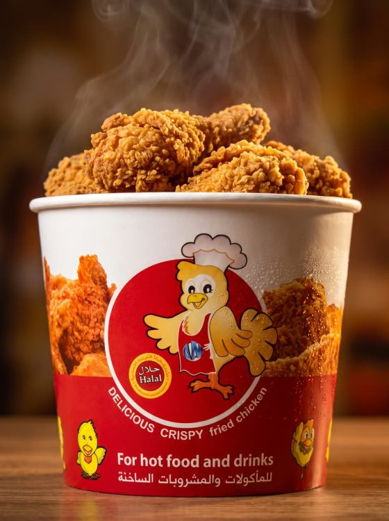 Printed paper bucket filled with hot fried chicken